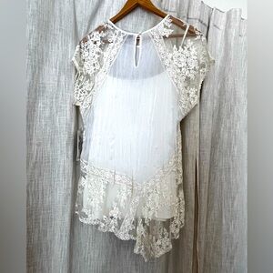 Brand new, very pretty lacy blouse.